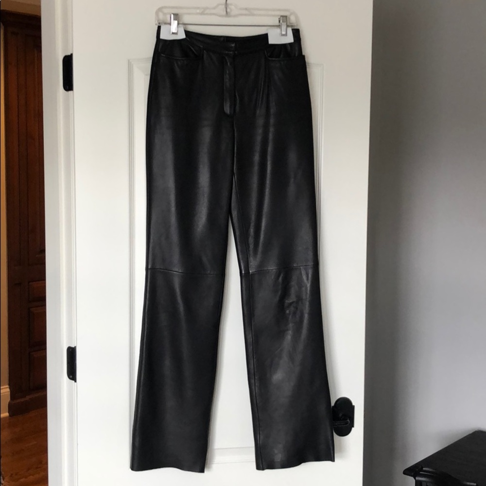 Excellent condition, lined black leather pants.